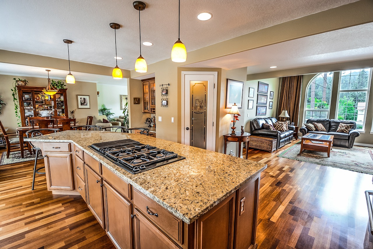 Renovated luxury kitchen with marble surfaces and custom cabinetry